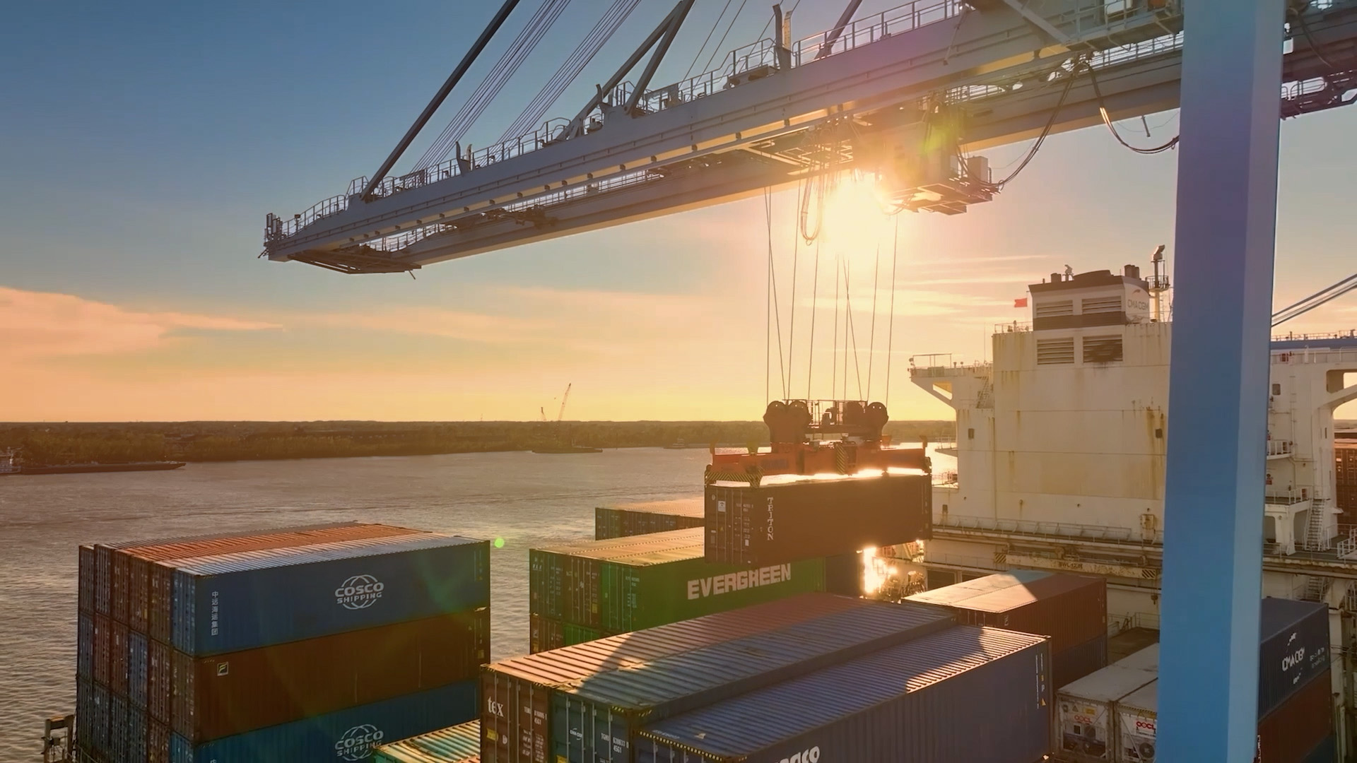 image of a crane lifting a container at a port